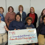 Presentation of checks to Community Youth Mentoring