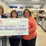 Martha, Pat and Linda proudly awarding Care and Share the total donation of $13,100.00.